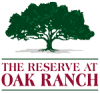 Logo with a large green oak tree above the text "The Reserve at Oak Ranch" in capital letters.