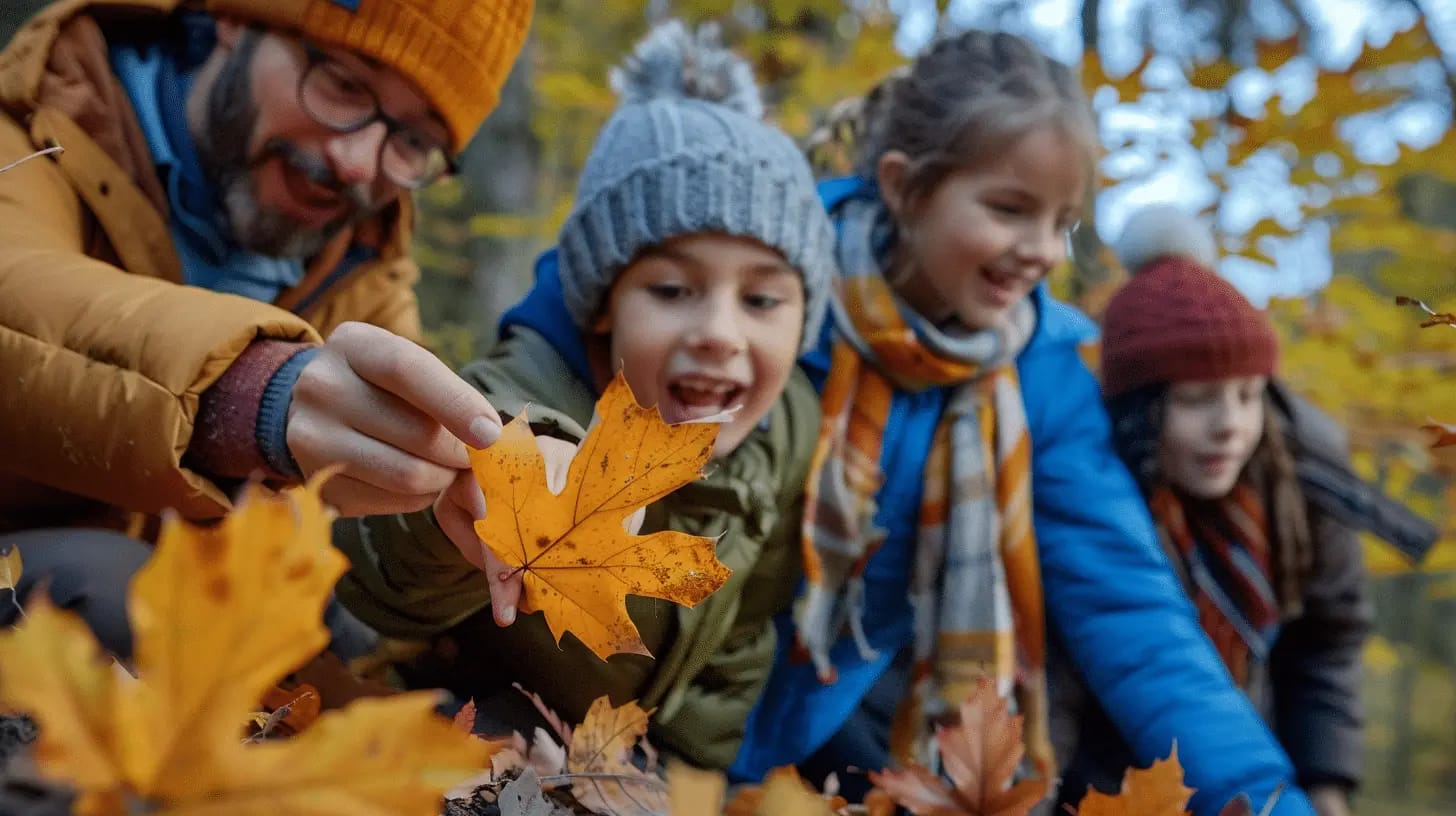 Family hiking through autumn leaves.