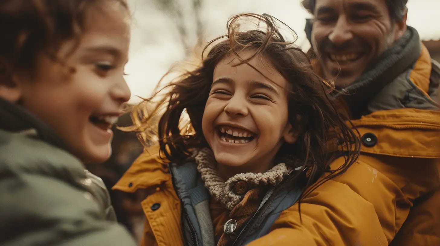 Happy family captured in close-up with joyful expressions.