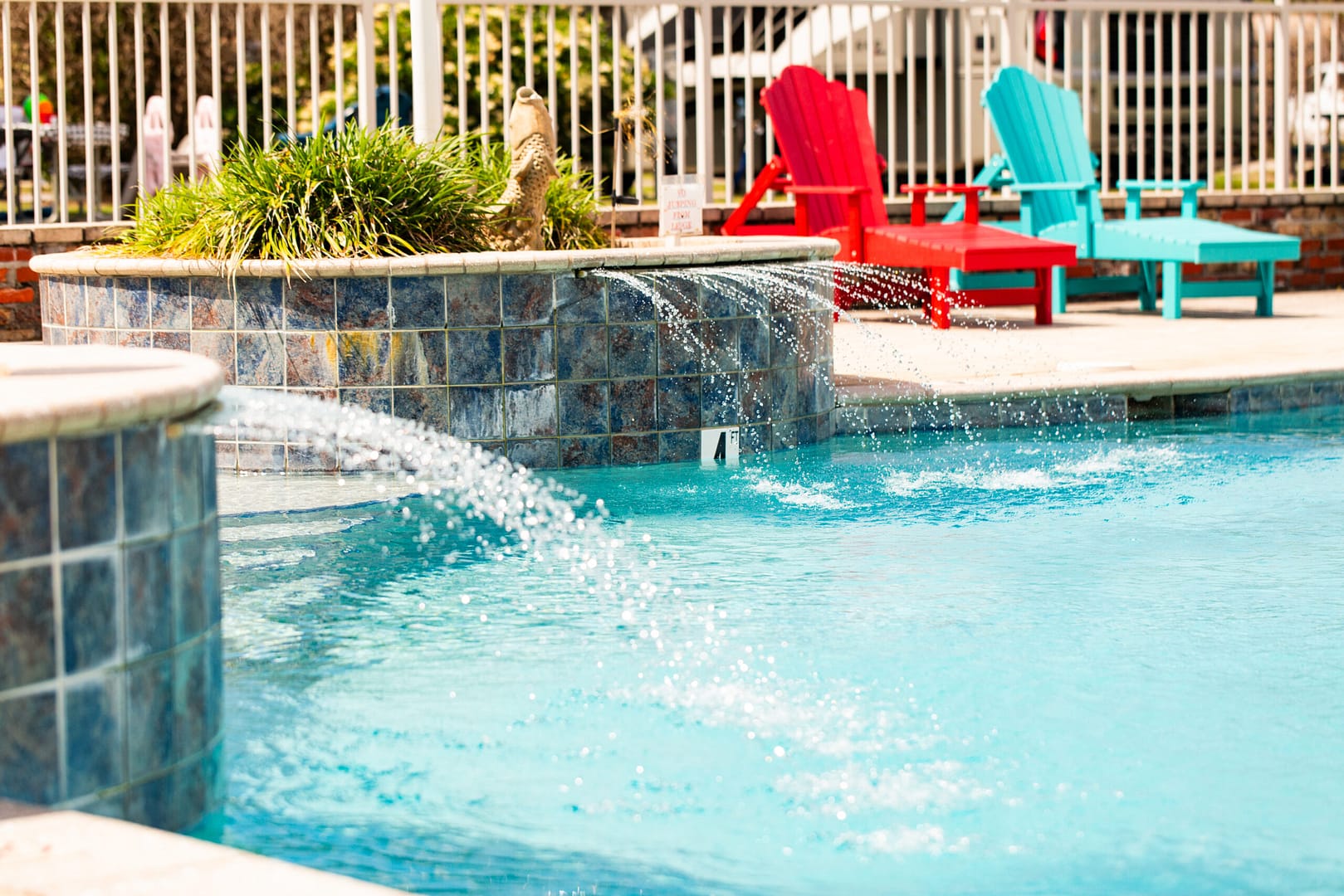 Resort‑style pool and splash pad at Sugar Sands RV Resort in Gulf Shores, Alabama.