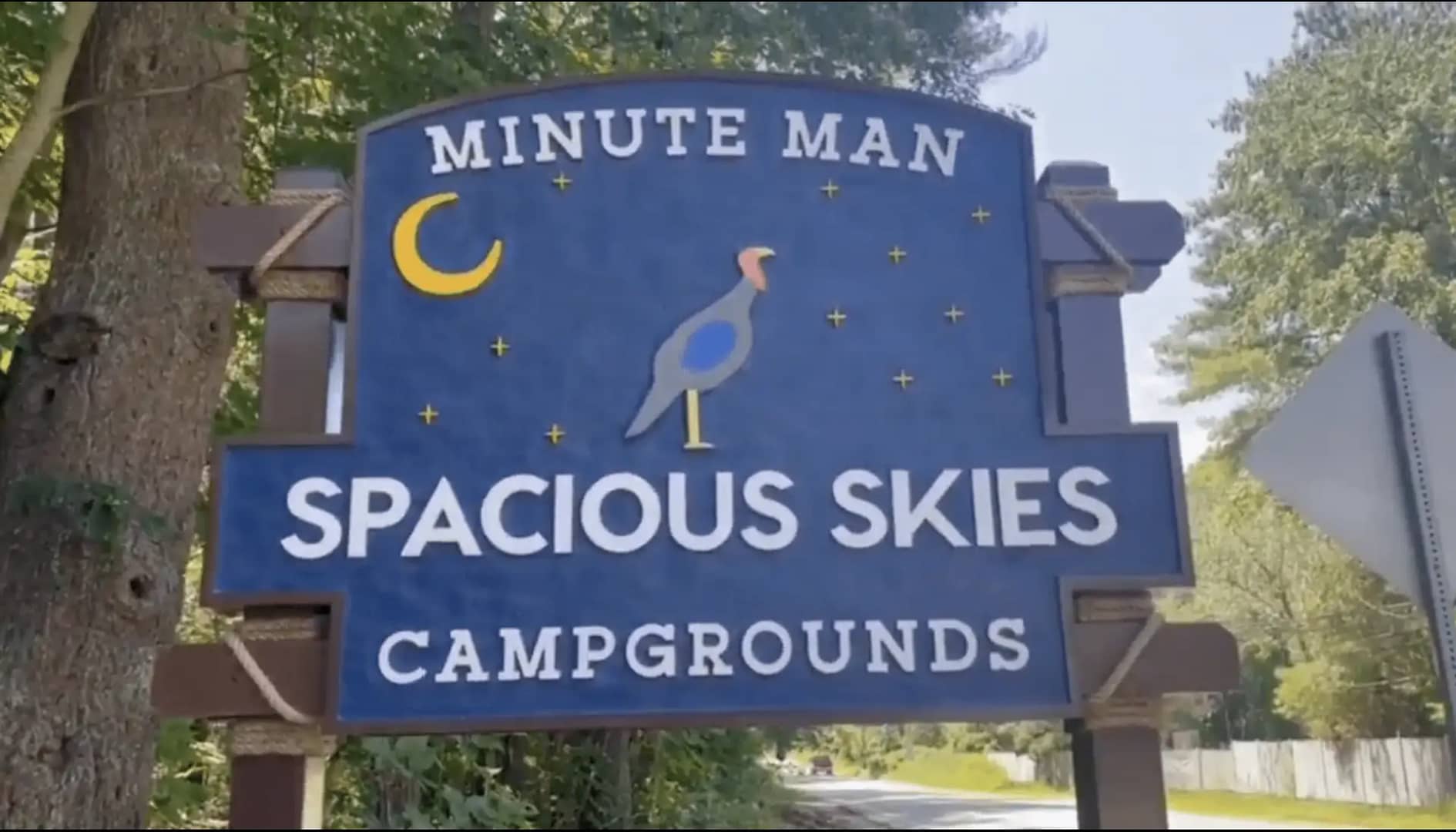 A sign at Minute Man Campgrounds displays the name "Spacific Skies.