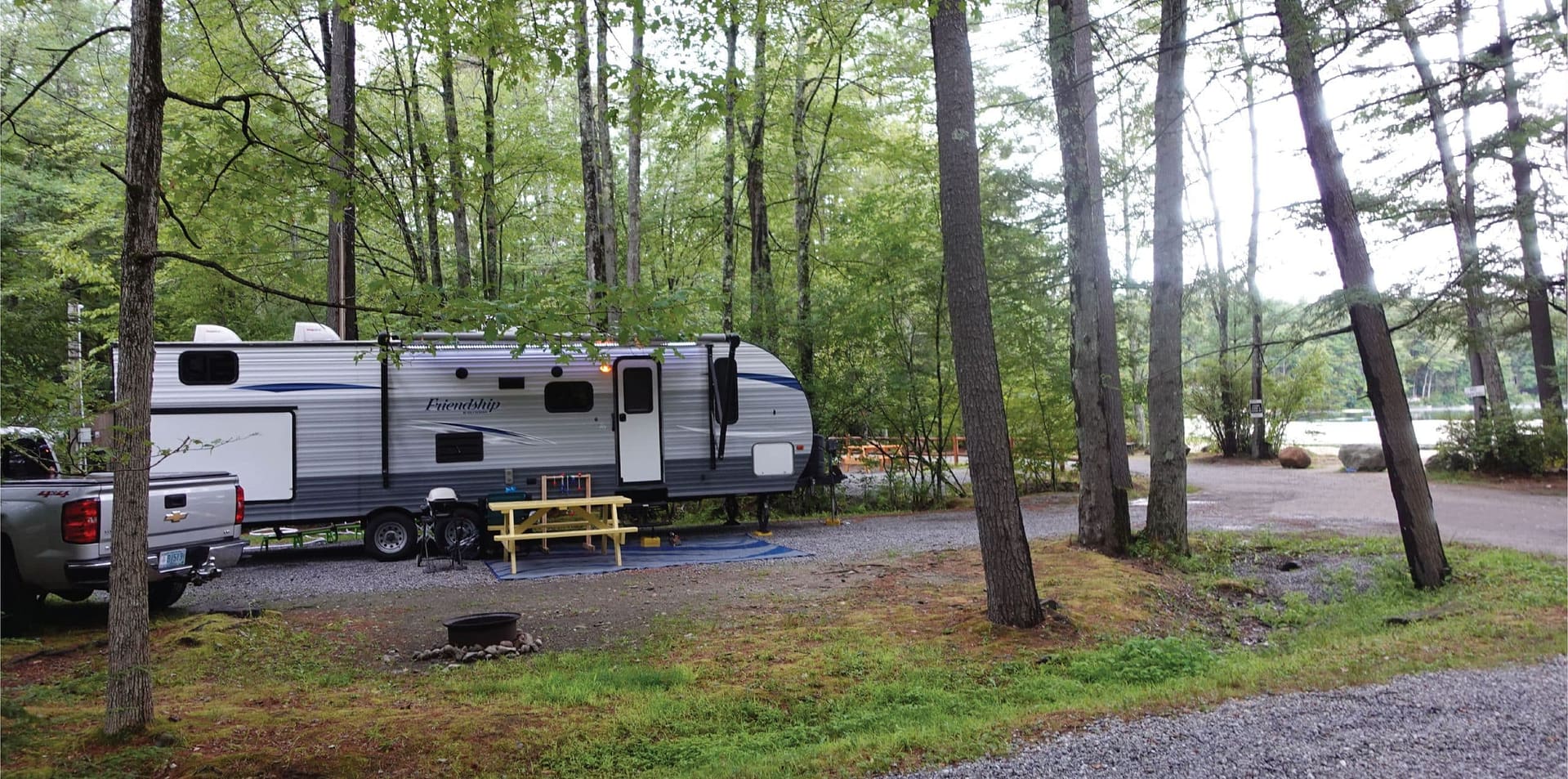 A trailer in a forest.