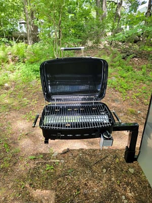 A grill in the woods.