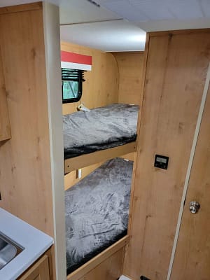 A bunk bed in a trailer.