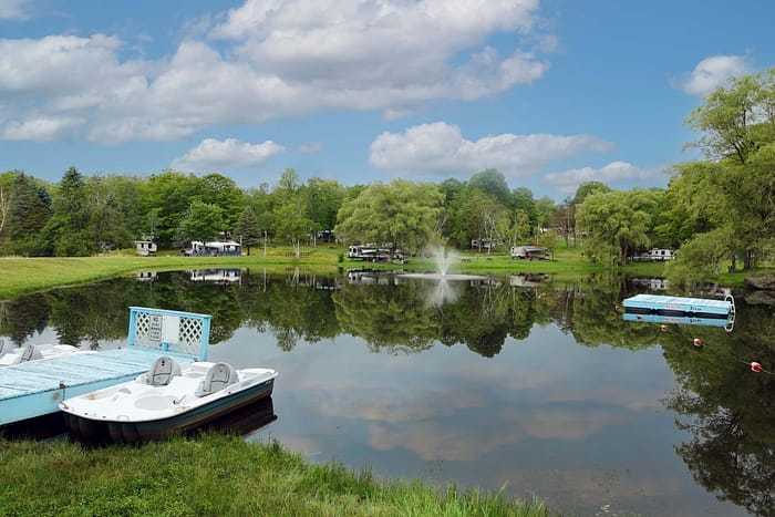 A pond with a boat on it.