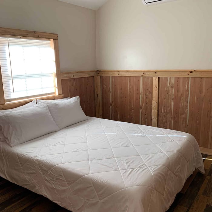 A bed in a room.