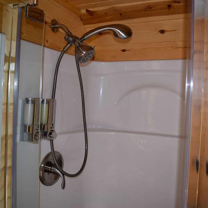 A shower head and shower head in a shower.