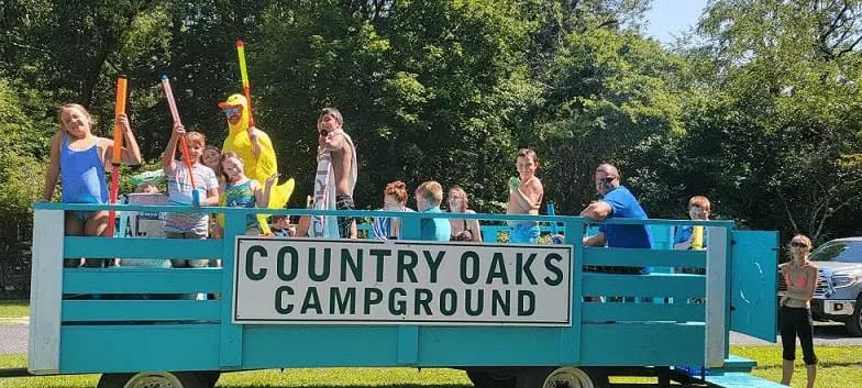 Campers enjoying themed weekends at Spacious Skies Country Oaks Campground