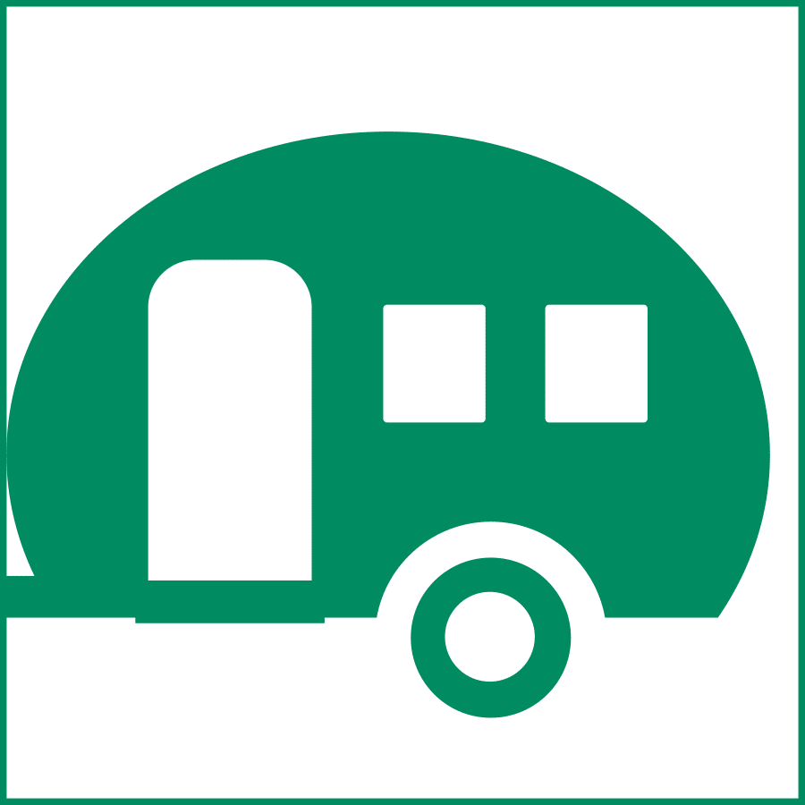 An icon of a green camper trailer on a green background.